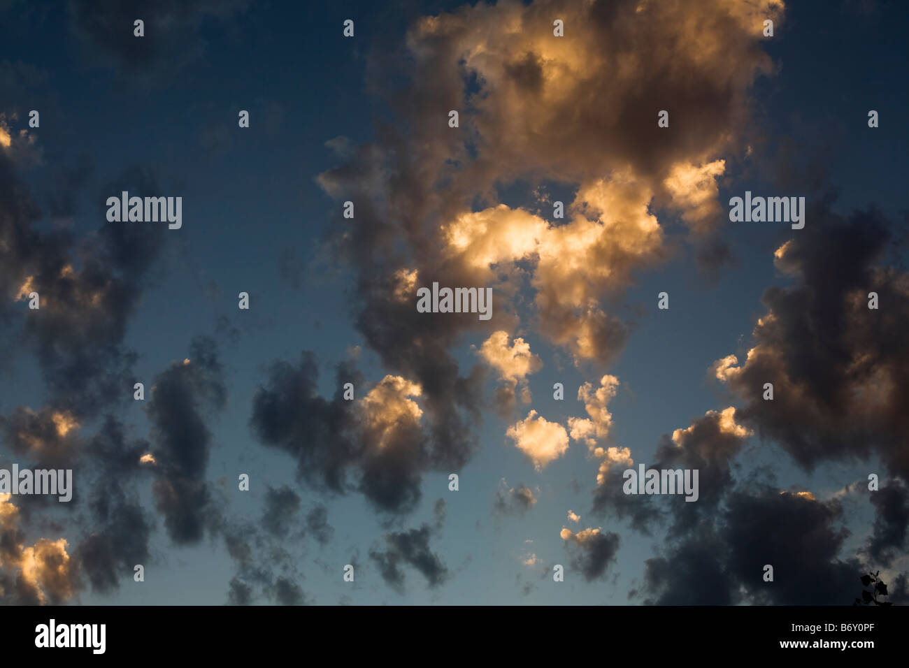 Amazing sunset sky with fire colours in the clouds Stock Photo - Alamy