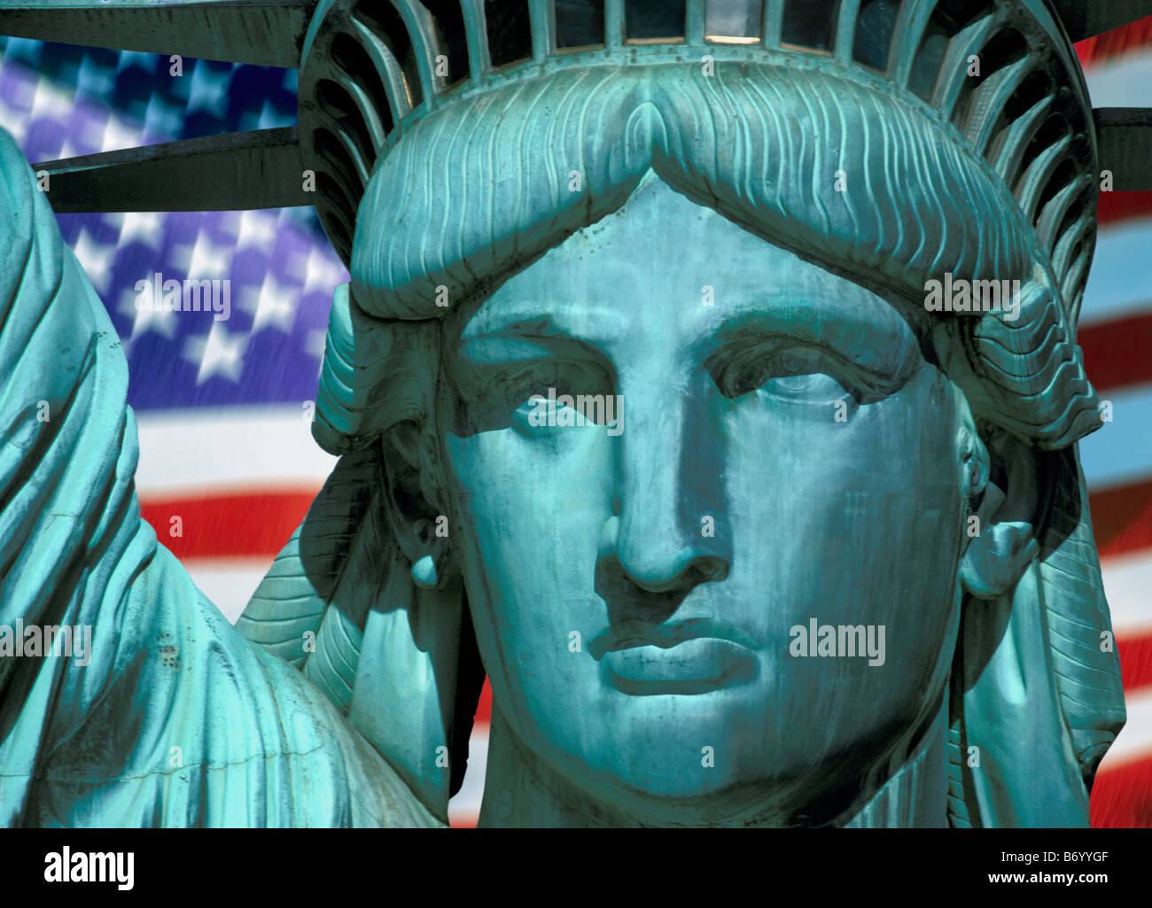Statue of Liberty with US flag Stock Photo
