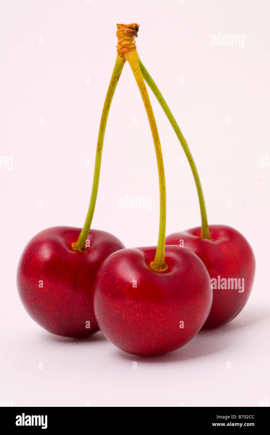 Three ripe cherries Stock Photo