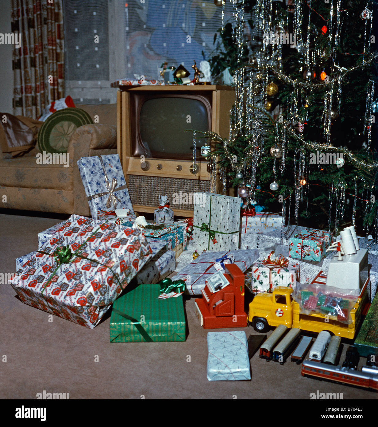 Christmas presents await opening, USA, c. 1960 Stock Photo