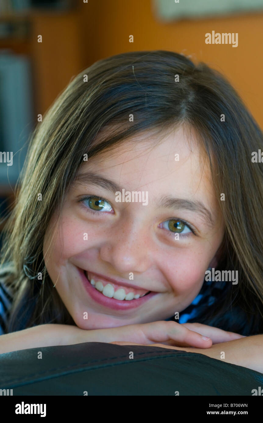 Smiling bright eyed 8 year old girl Stock Photo
