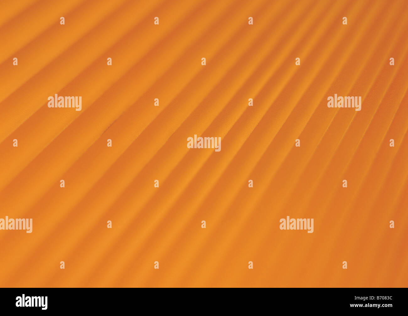 Orange corrugated paper Stock Photo - Alamy