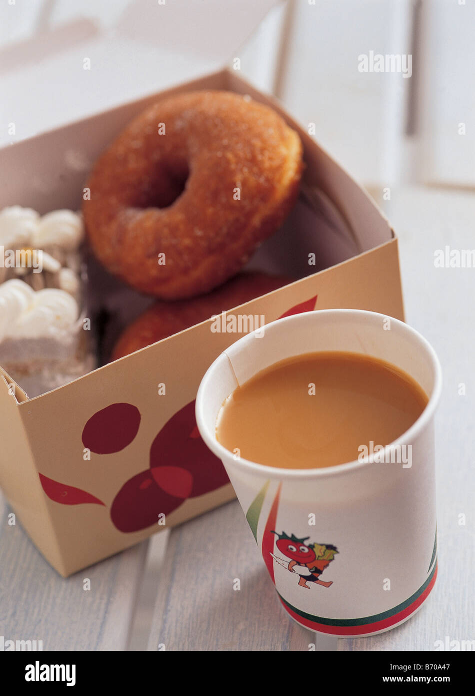 Coffee with donut Stock Photo Alamy