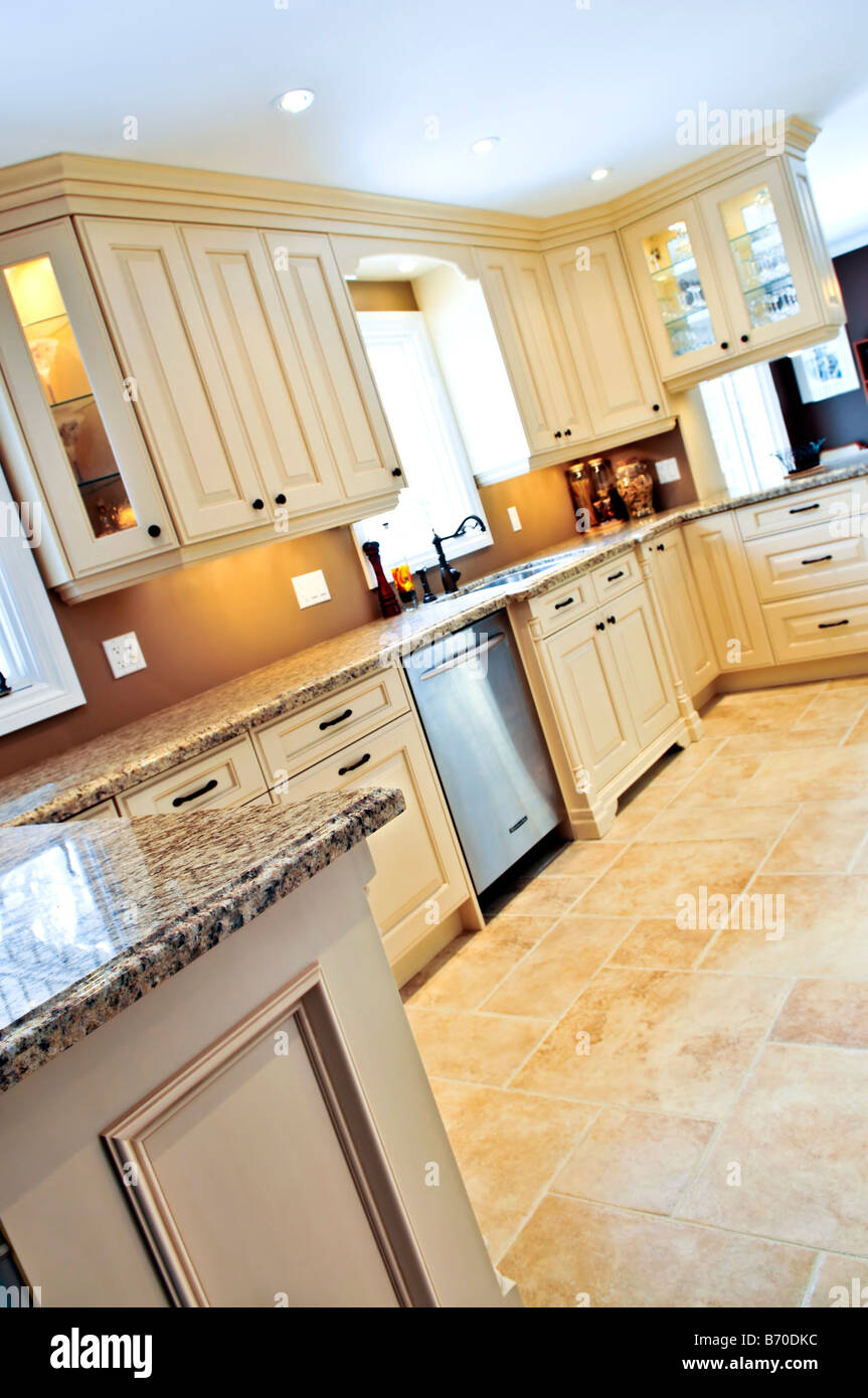 Modern luxury kitchen with ceramic tile floor Stock Photo