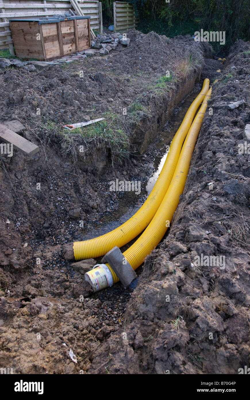 Land Drain Pipes In Position In A Trench Prior To Being Covered