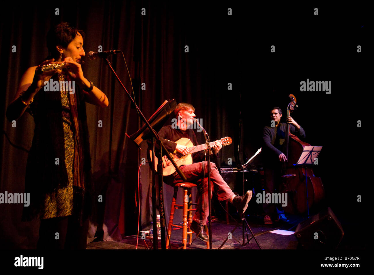 Jazz band trio performing in stage Stock Photo