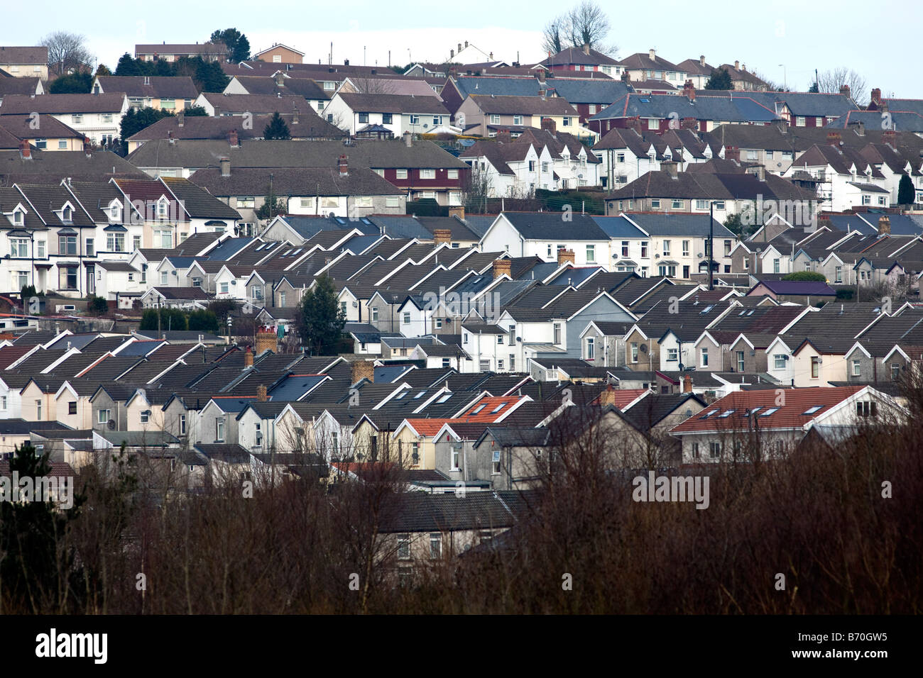 Rows of houses on a hillside in the town of Merthyr Tydfil Wales Stock