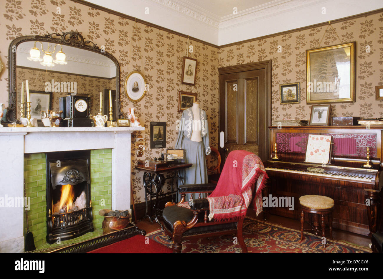 Glasgow The Tenement House period sitting room Scotland UK interior view museum furnished fire furniture domestic heritage Stock Photo