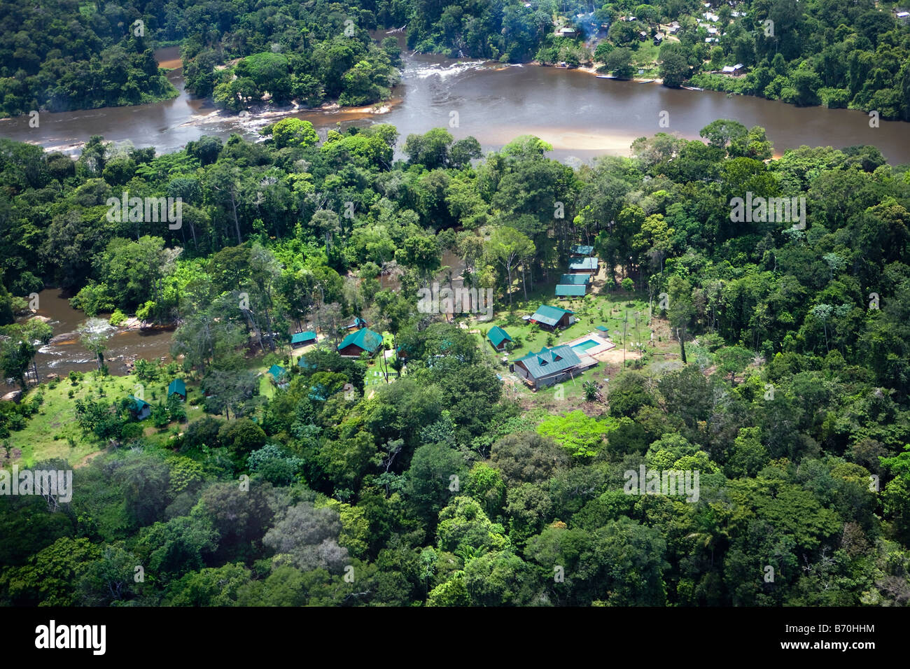 Suriname, Laduani, Nieuw Aurora, at the bank of the Boven Suriname river. Anaula Nature Resort. Aerial. Stock Photo