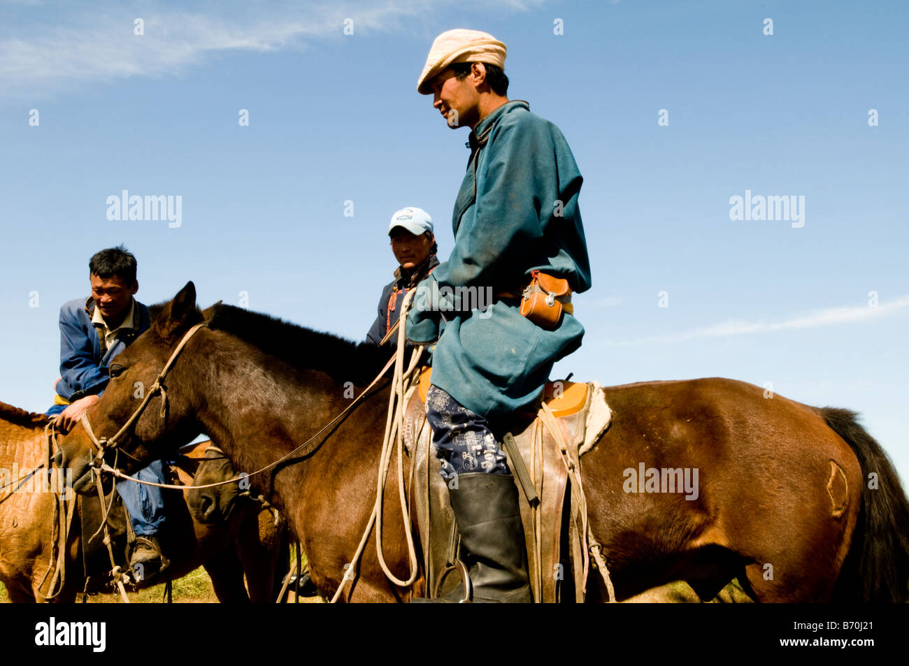 Mongolian nomads on their horses Stock Photo - Alamy