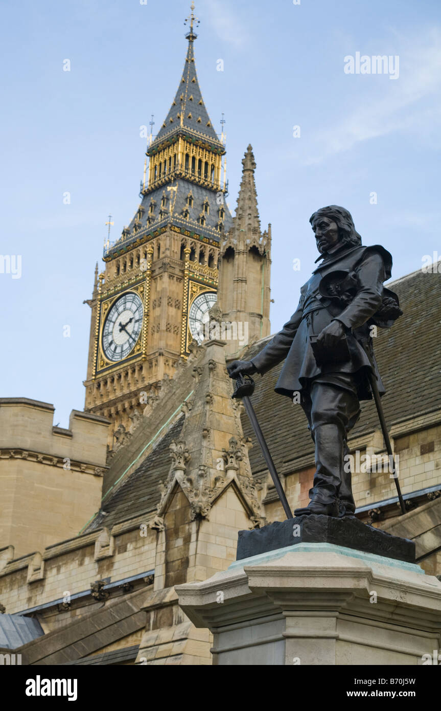 Statue of Oliver Cromwell MP (by Sir William Hamo Thornycroft) & 'Big Ben' behind. Houses of Parliament, Westminster London UK Stock Photo