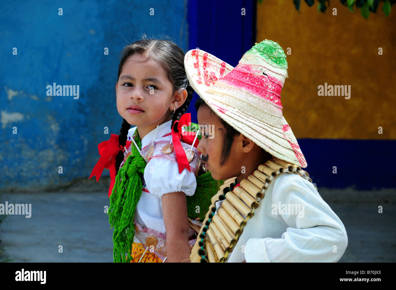 Mexican children in national costume parading on Anniversary of the Revolution Stock Photo