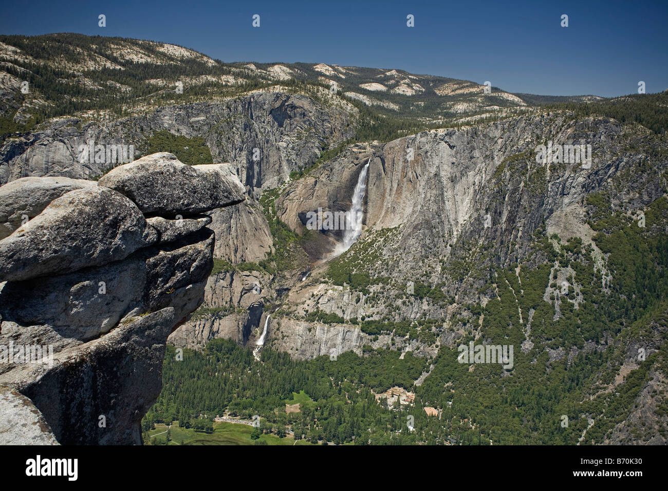CALIFORNIA - Upper and Lower Yosemite Falls and the Yosemite Valley from Glacier Point in Yosemite National Park. Stock Photo