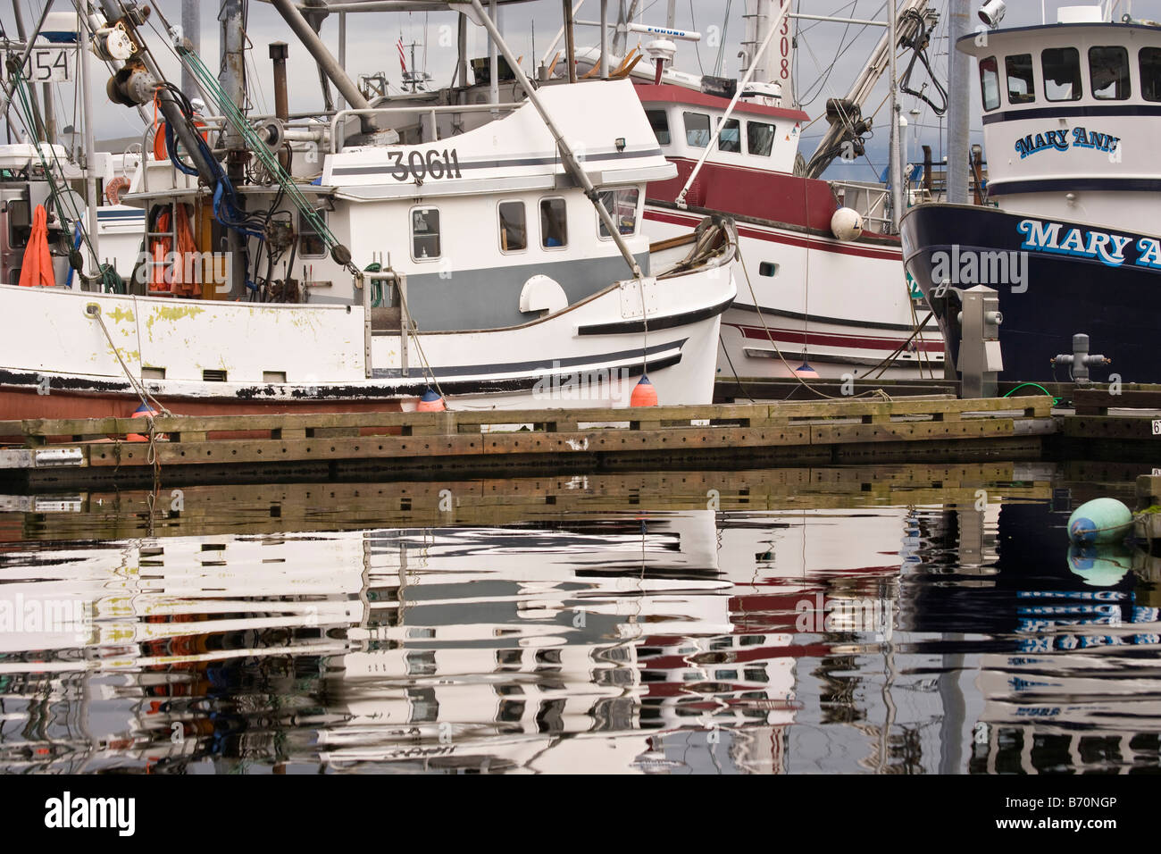 Fishing boats on pier hi-res stock photography and images - Alamy