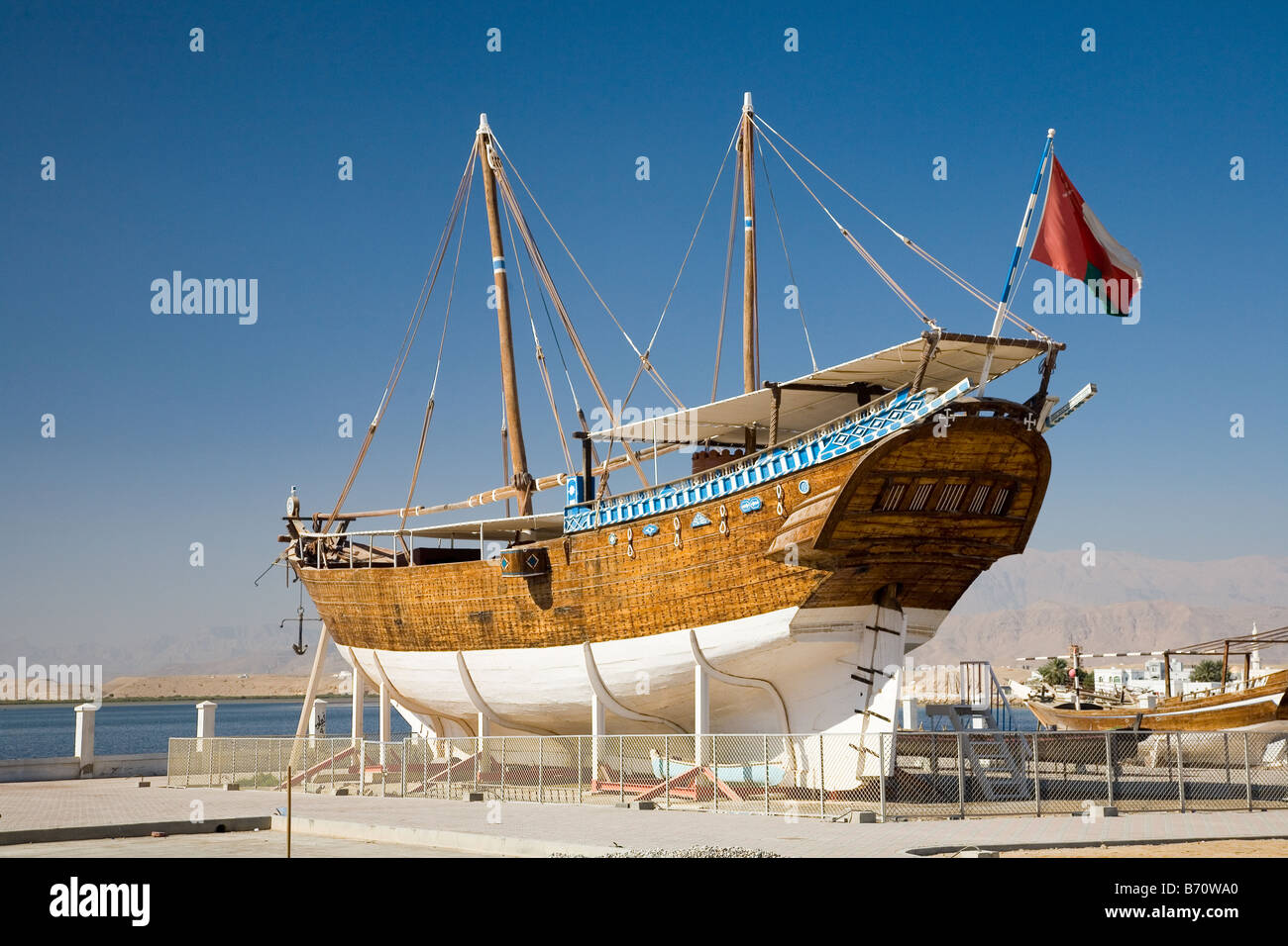 A Dhow about 100 years old preserved on the quay at Sur in Oman Stock Photo