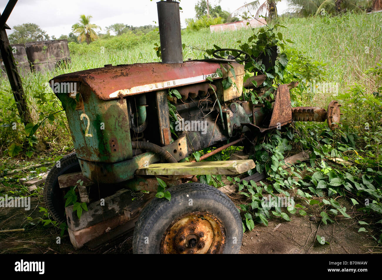 Suriname, Paramaribo, Restored plantation called Frederiksdorp at the Commewijne river. Old tractor. Stock Photo