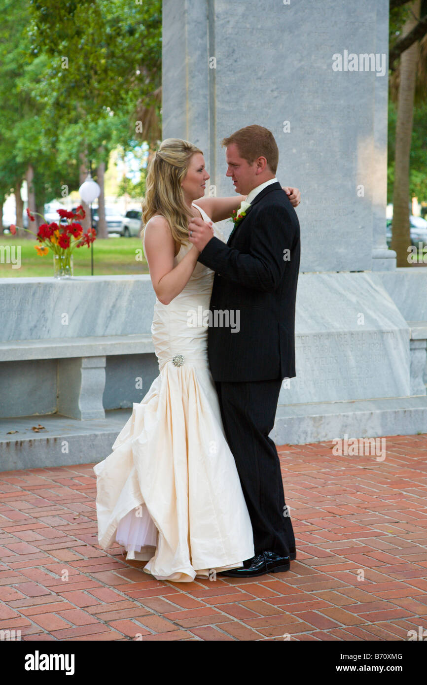 Bride and Groom dancing outdoors at wedding reception Stock Photo - Alamy