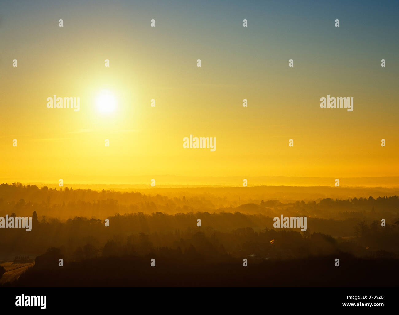 View over Oxted from the North Downs, Kent, England, UK. Dawn Stock Photo