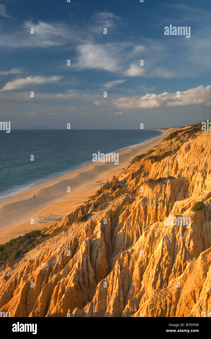 Galé cliffs with sunset light with human figure,Alentejo,Portugal Stock Photo