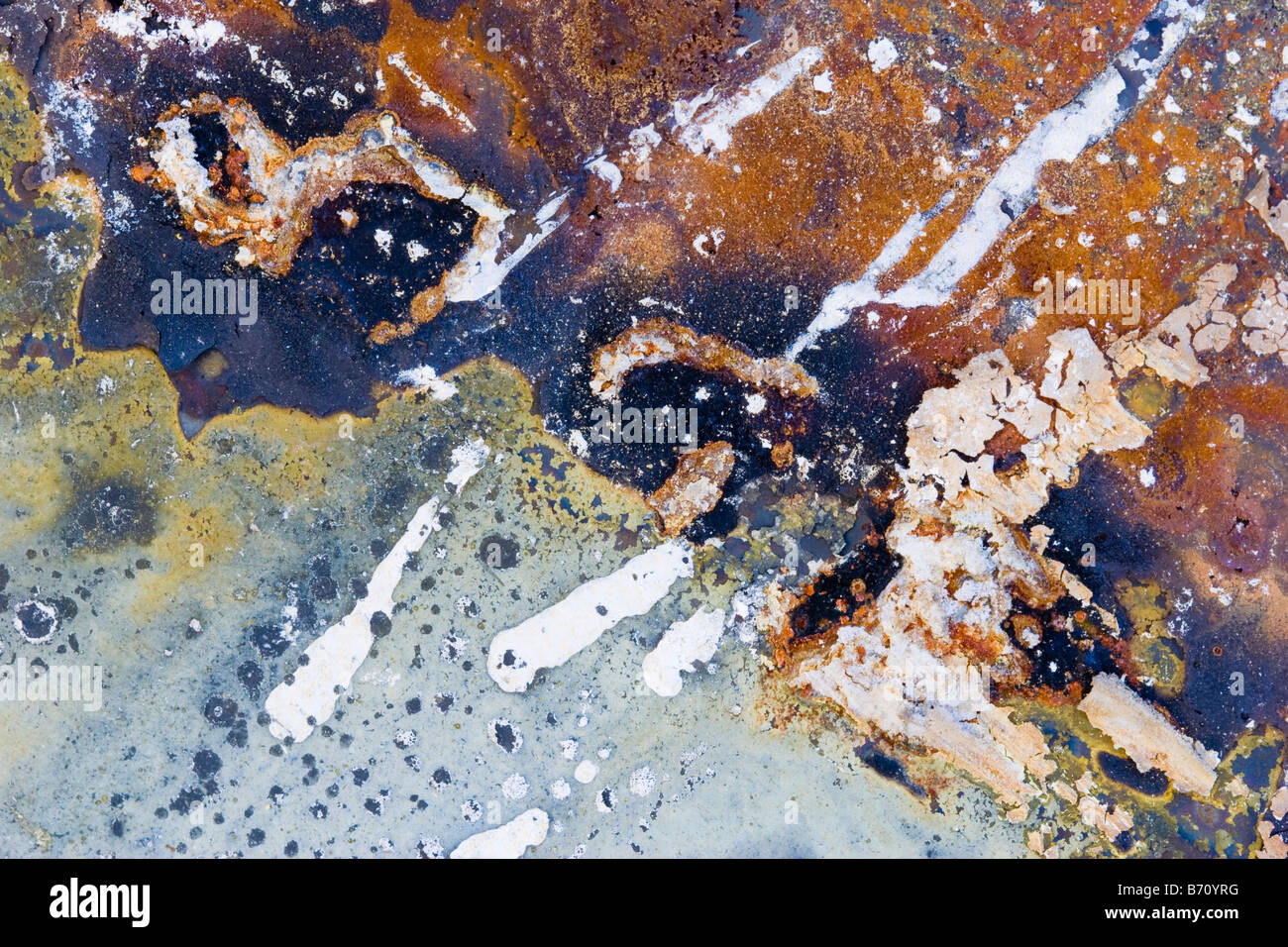 Background abstract texture of rusted metal in shades or orange purple ...
