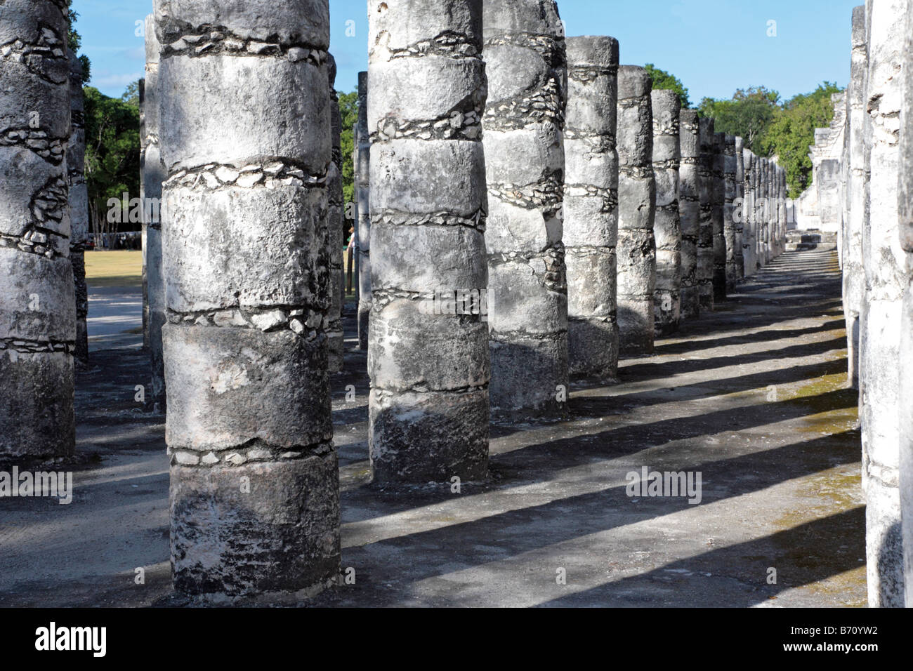 Mayan stone pillar in Chichen Itza Yucatan Mexico Stock Photo