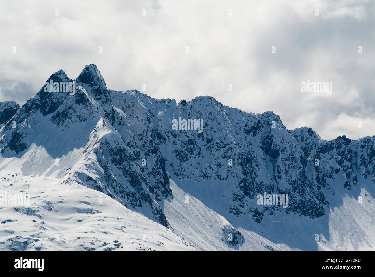 Mountains covered with snow in the Swiss Alps Stock Photo - Alamy