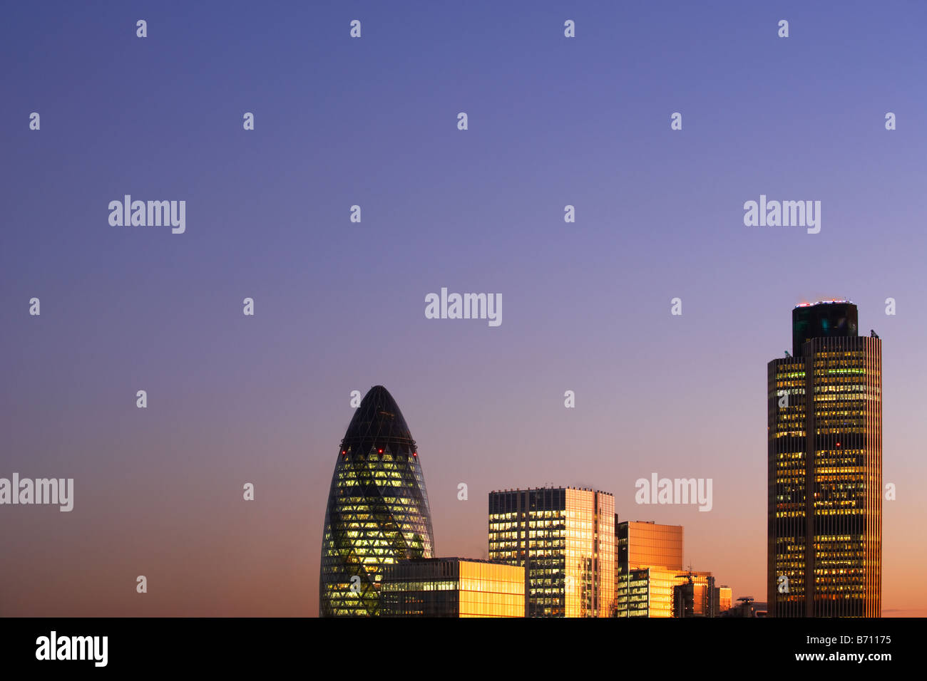 Nat West Tower Gherkin and London skyline at sunset London England Stock Photo