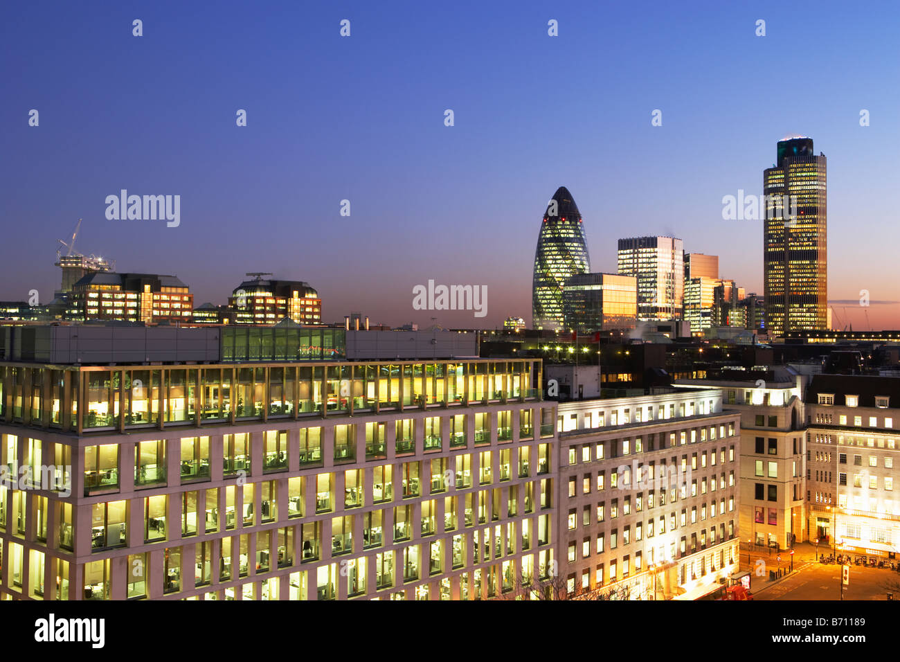 Night shot of Nat West Tower Gherkin and London skyline London England Stock Photo
