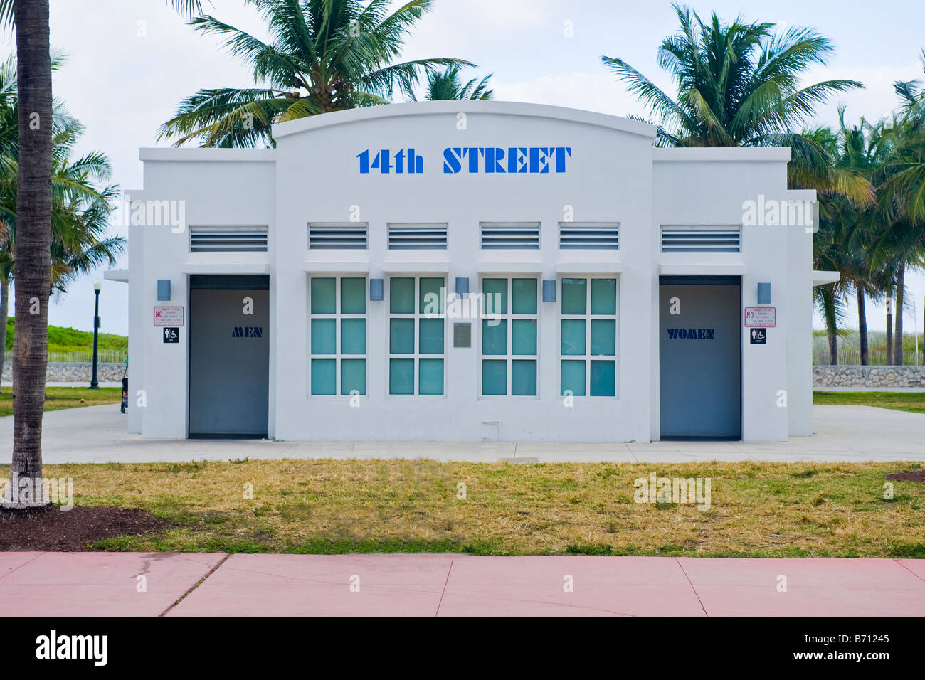 Miami South Beach Ocean Drive Lummus Park , 14th Street art deco public toilets or conveniences in blue & white by beach & park Stock Photo