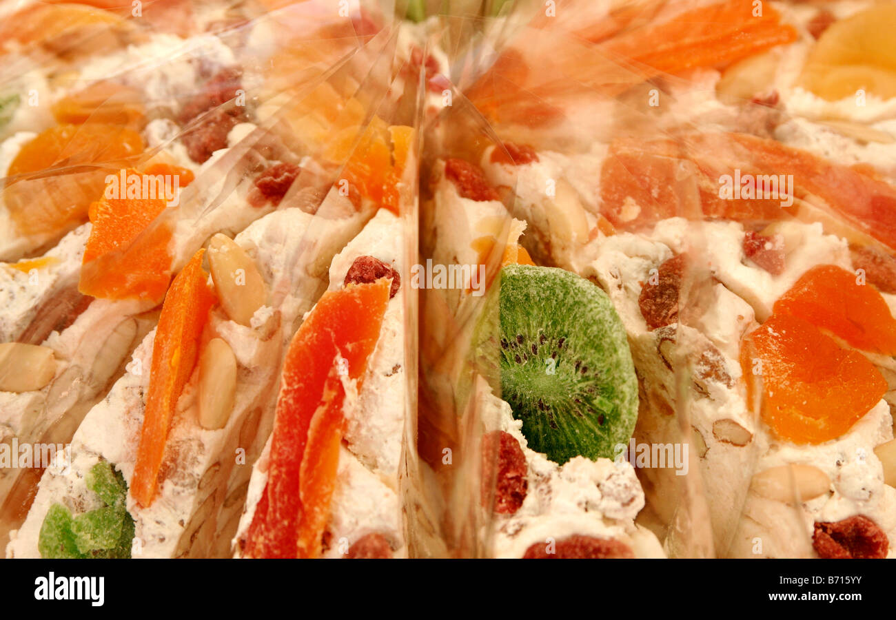 Round Mixed Fruit Nougat cake individually sliced and cellophane