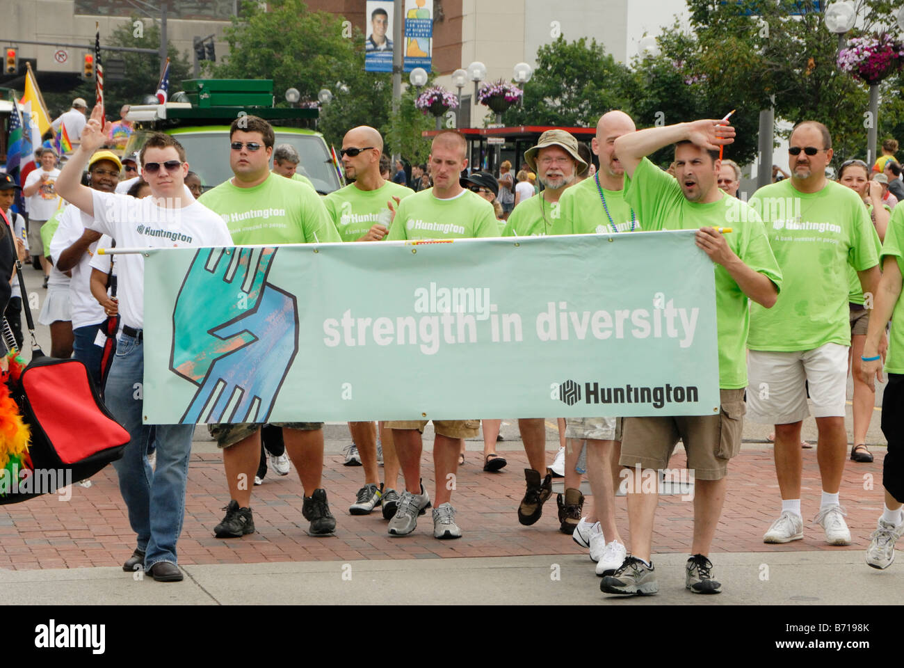 Huntington Bank Employees Carrying Strength In Diversity Banner In