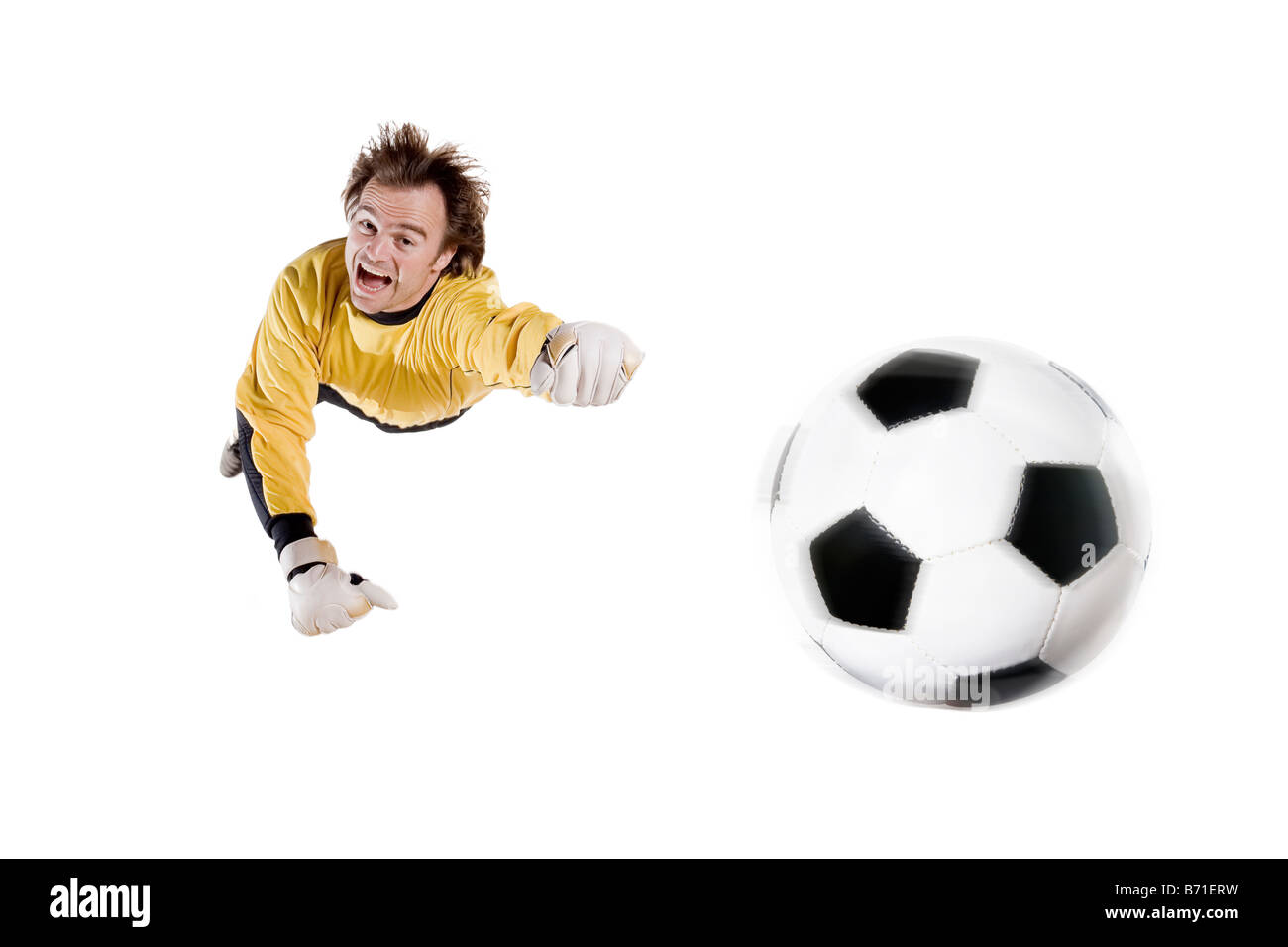 Young goalkeeper in action Full isolated studio picture Stock Photo