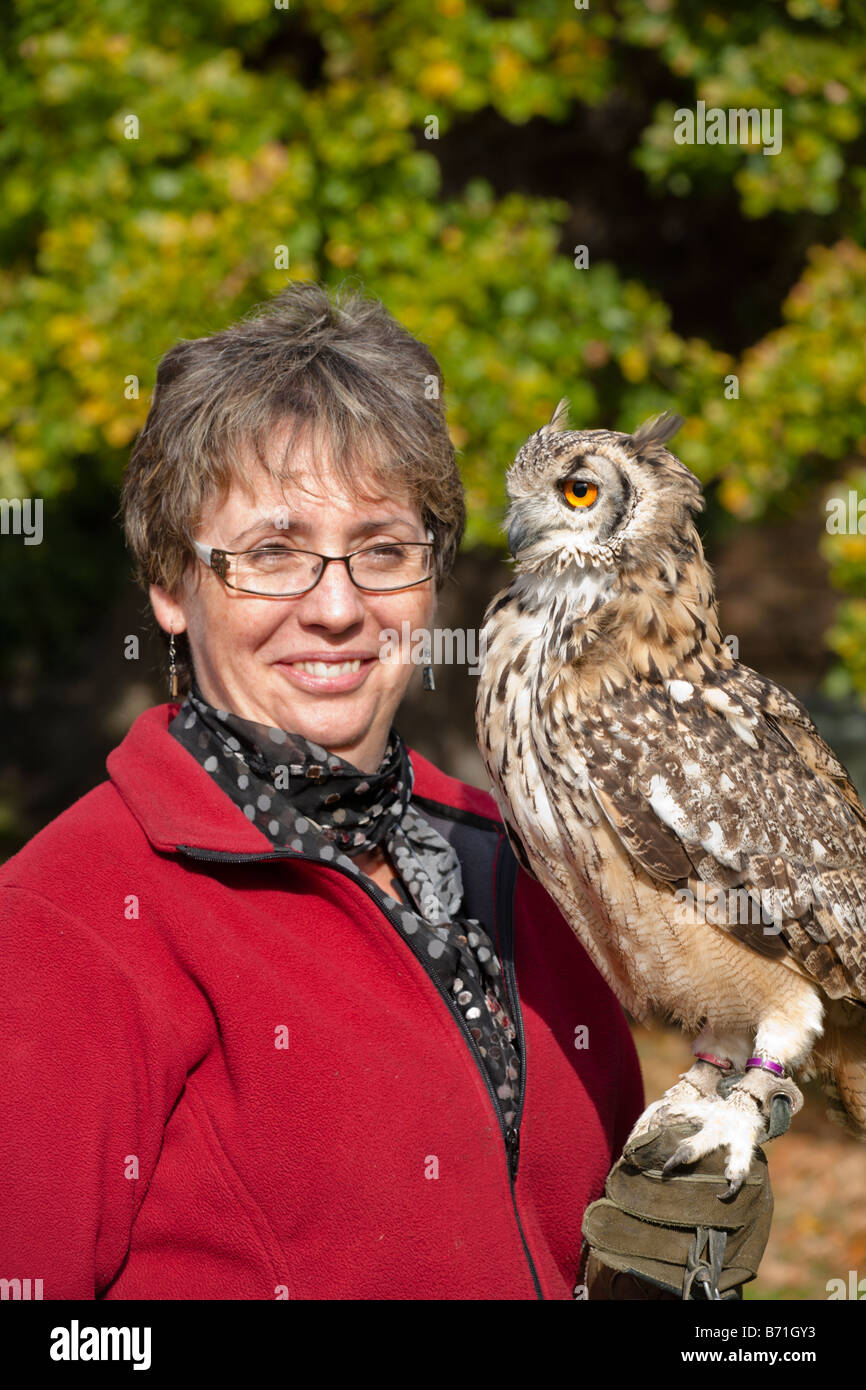 Woman with Bengal Eagle Owl Bengalese Bubo bubo bengalensis Stock Photo