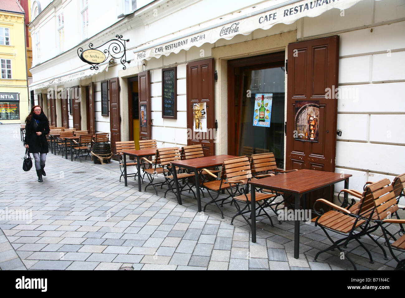 Street scene  in Bratislava,  Slovakia , chairs of a cafe bar in the street Stock Photo