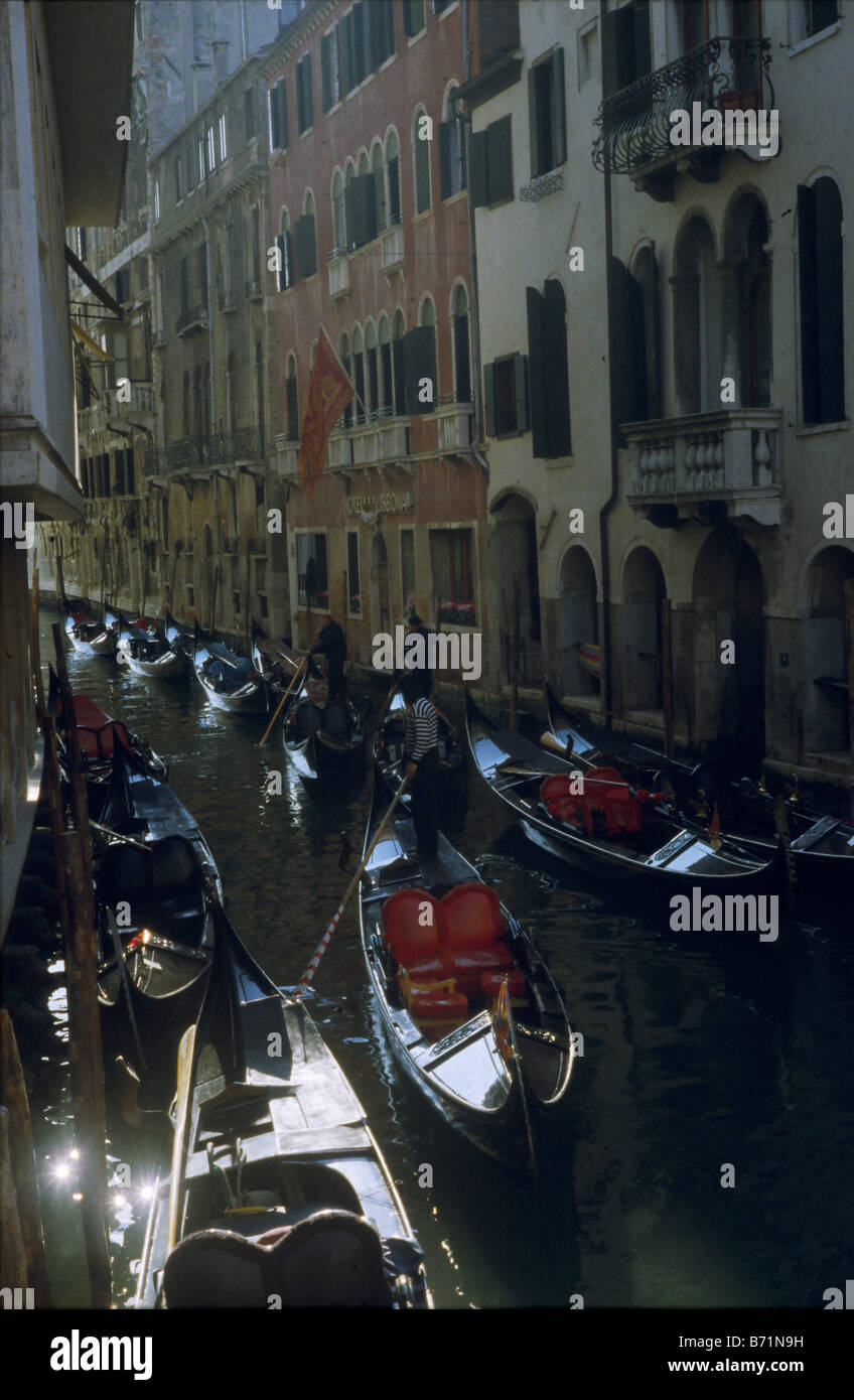 Gondolas in backlit channel Venice Italy Stock Photo - Alamy