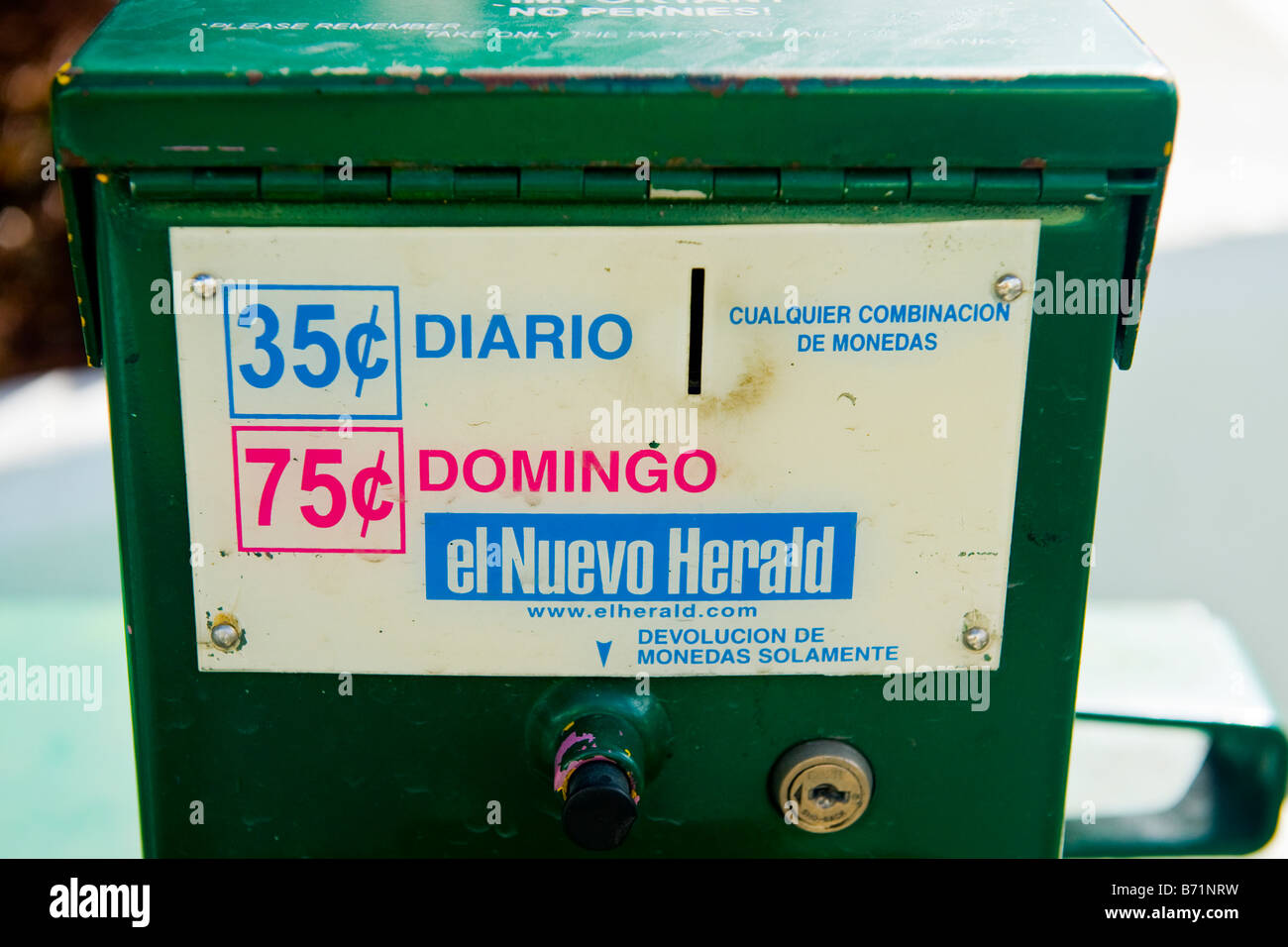 Miami street scene , newspaper coin operated vending slot machine with everything in Spanish for