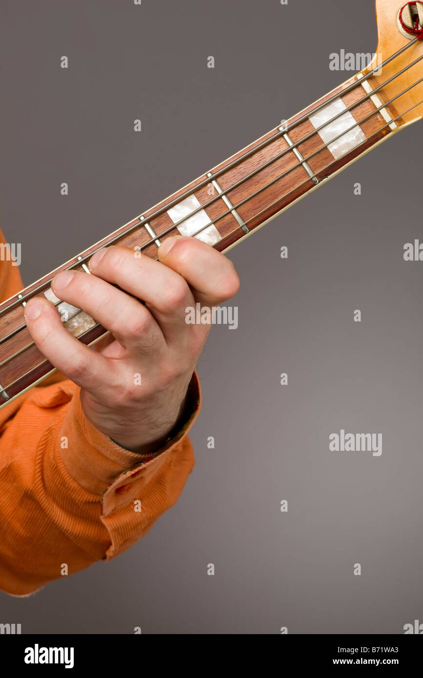 Close up of bass player's left hand Stock Photo