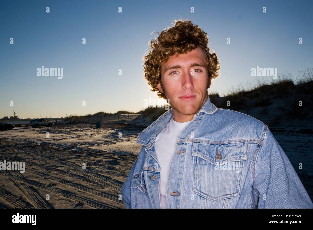 Person curly hair wearing denim hi-res stock photography and images - Alamy
