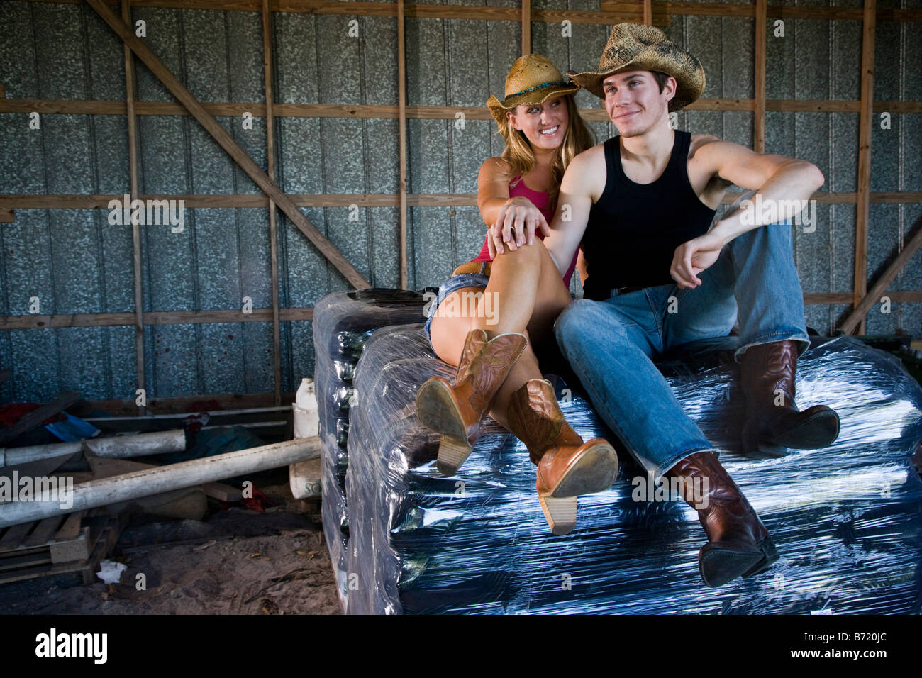 Young woman wearing cowboy boots hi-res stock photography and images ...