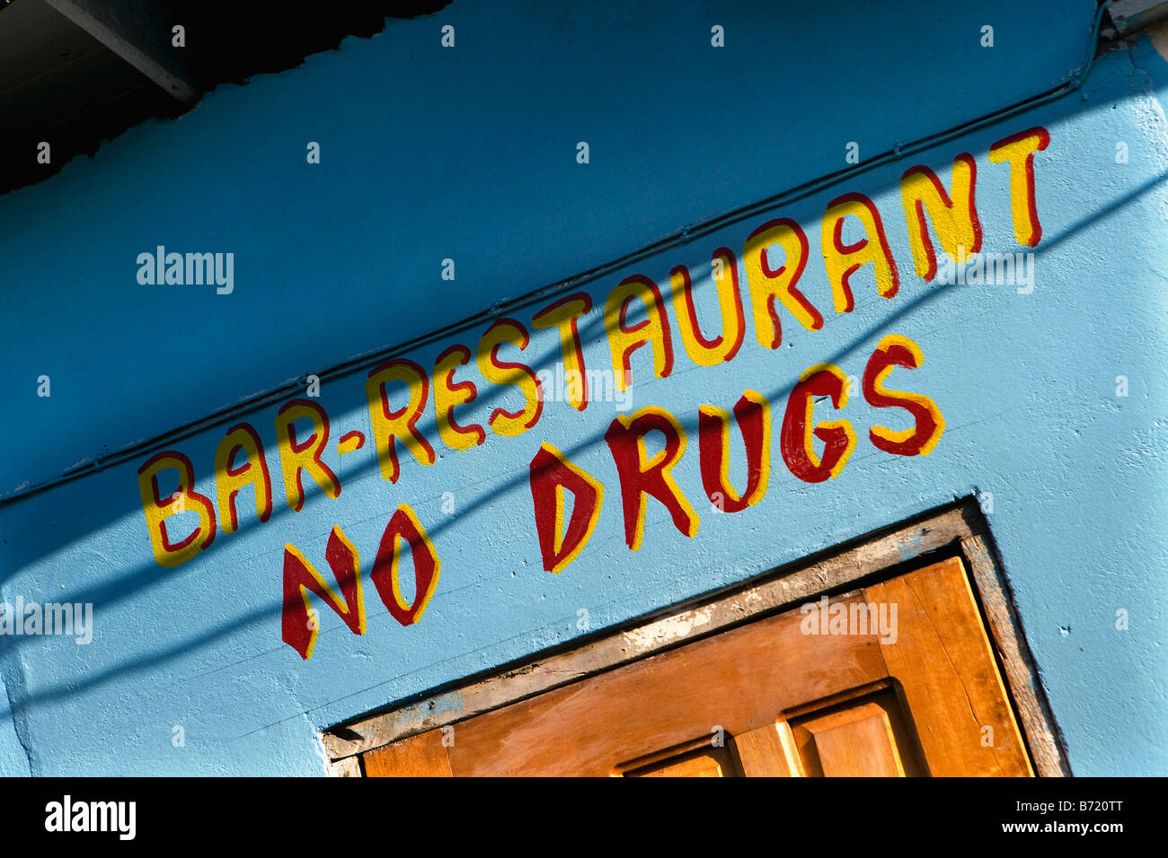 Suriname, Paramaribo. Restaurant sign saying 'no drugs'. Stock Photo