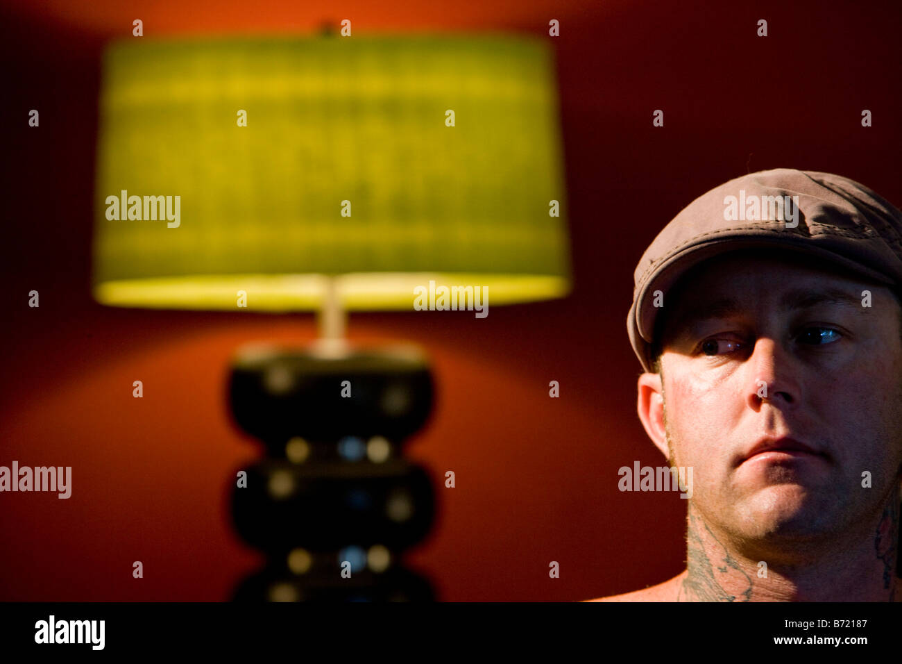 Headshot of young man with tattoo design on neck Stock Photo Alamy