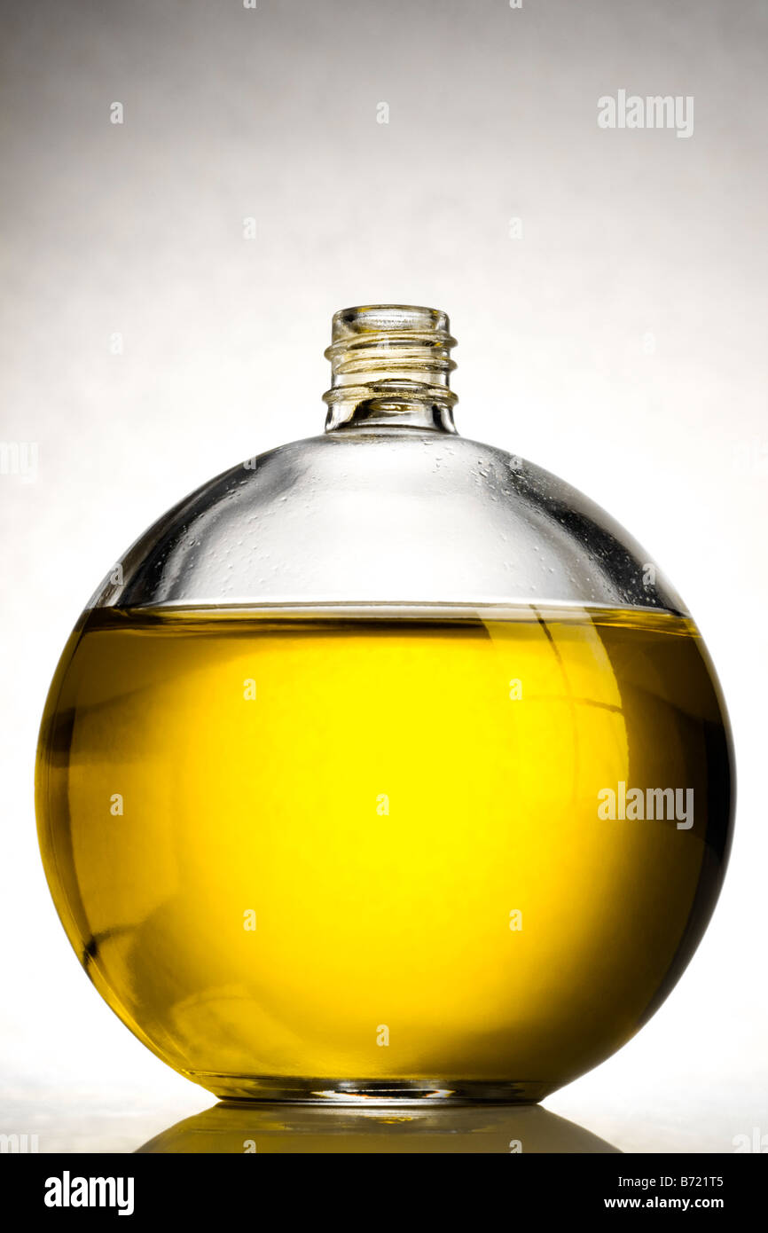 a bottle of yellow liquid Stock Photo