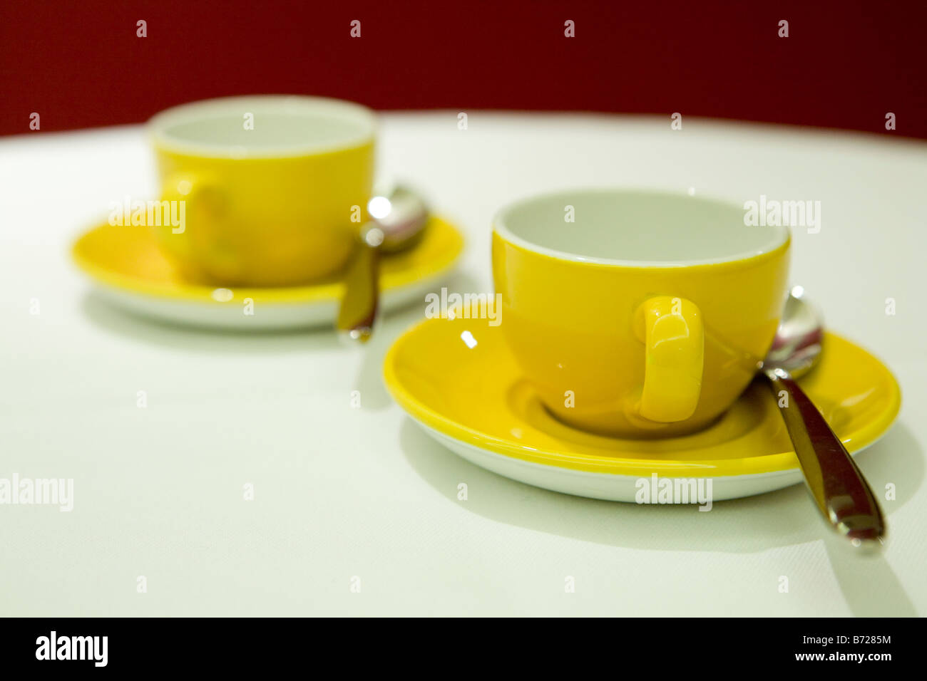 Yellow coffee cups Stock Photo Alamy