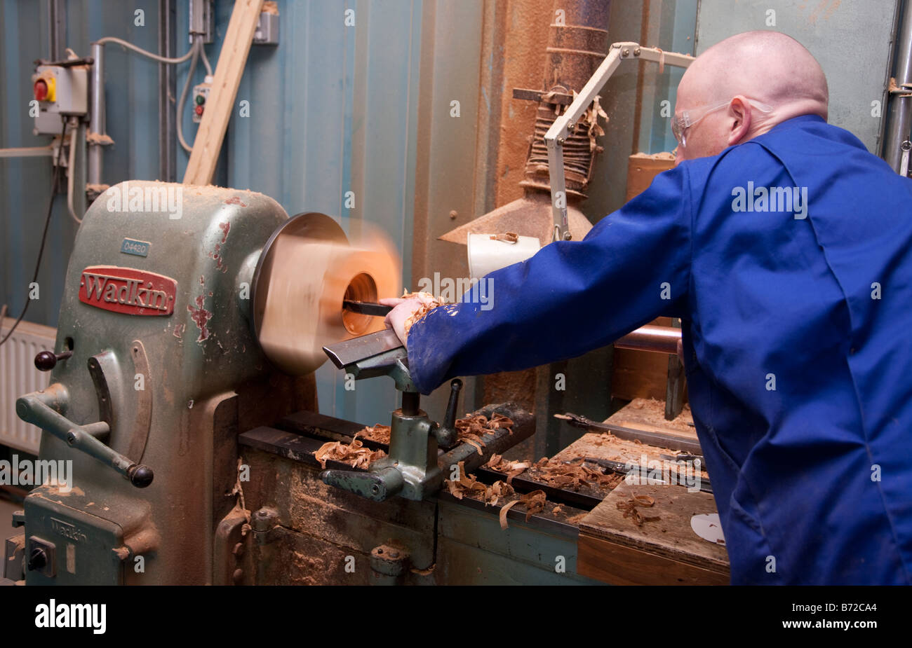 Wood turning on a lathe Stock Photo Alamy