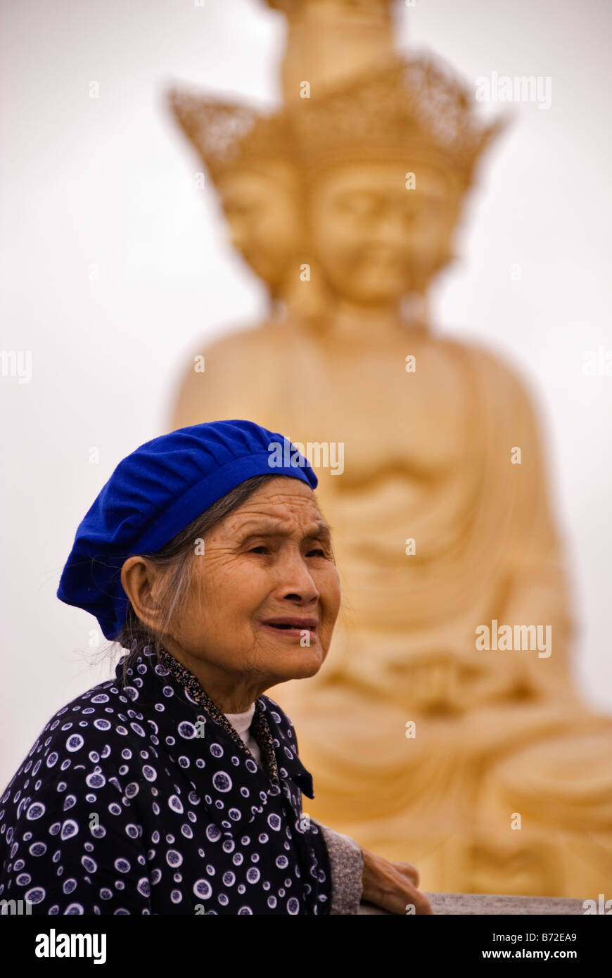 Chinesse woman at the Golden Summit Temple Emei Shan Sichuan China Stock Photo