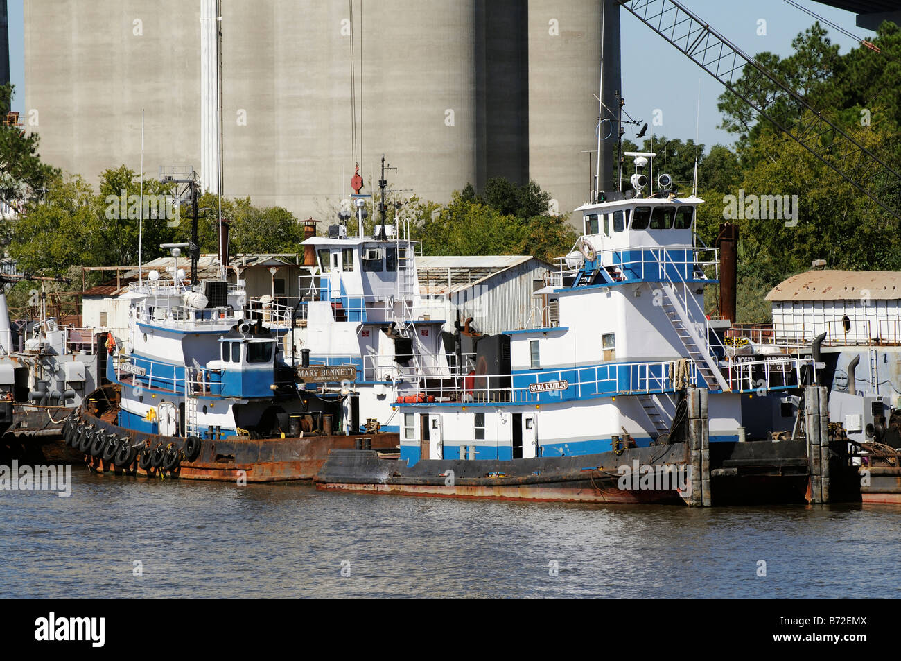 Tugs alongside the Savannah River Georgia America USA Stock Photo