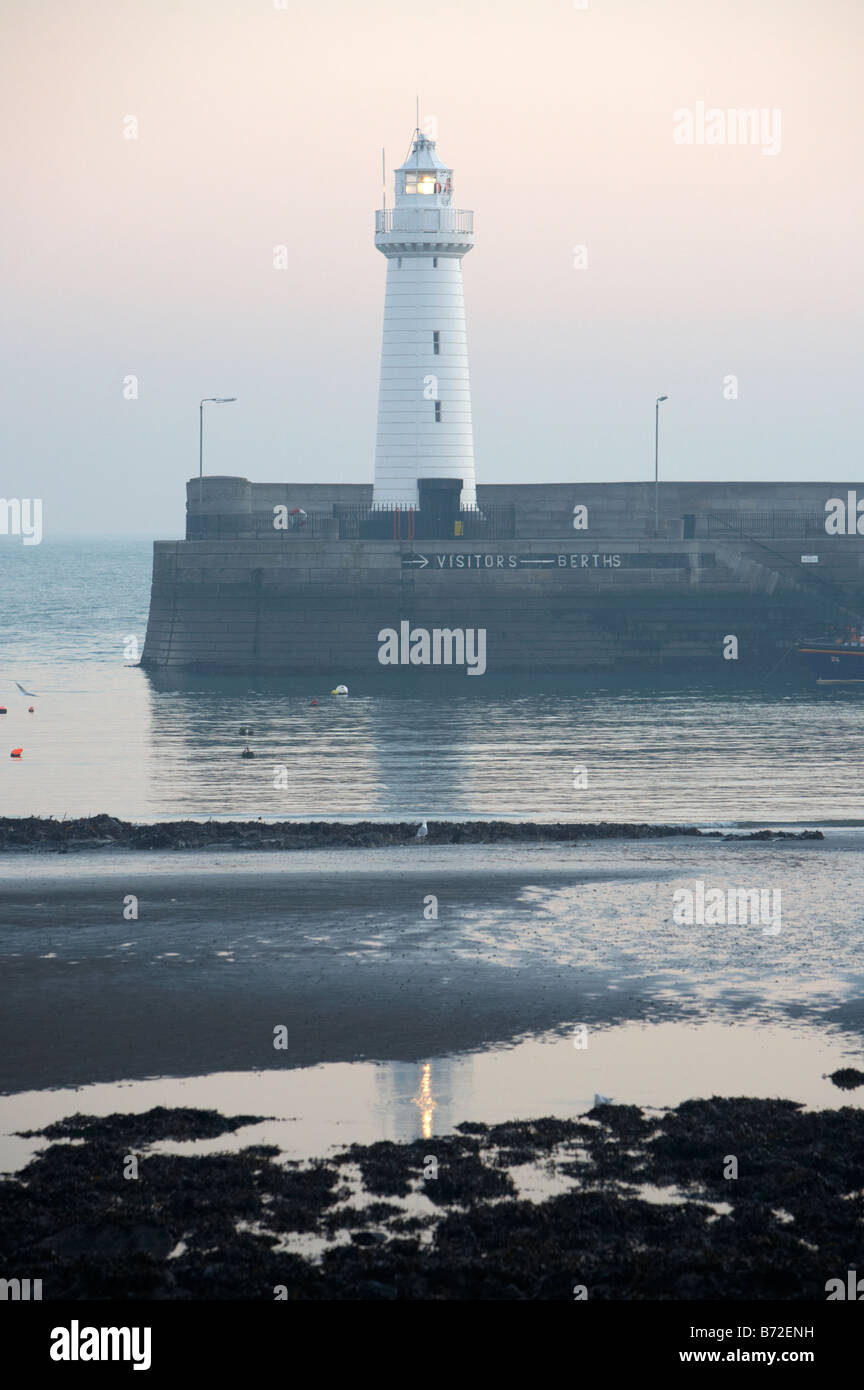 Donaghadee lighthouse illuminated low tide hires stock photography and