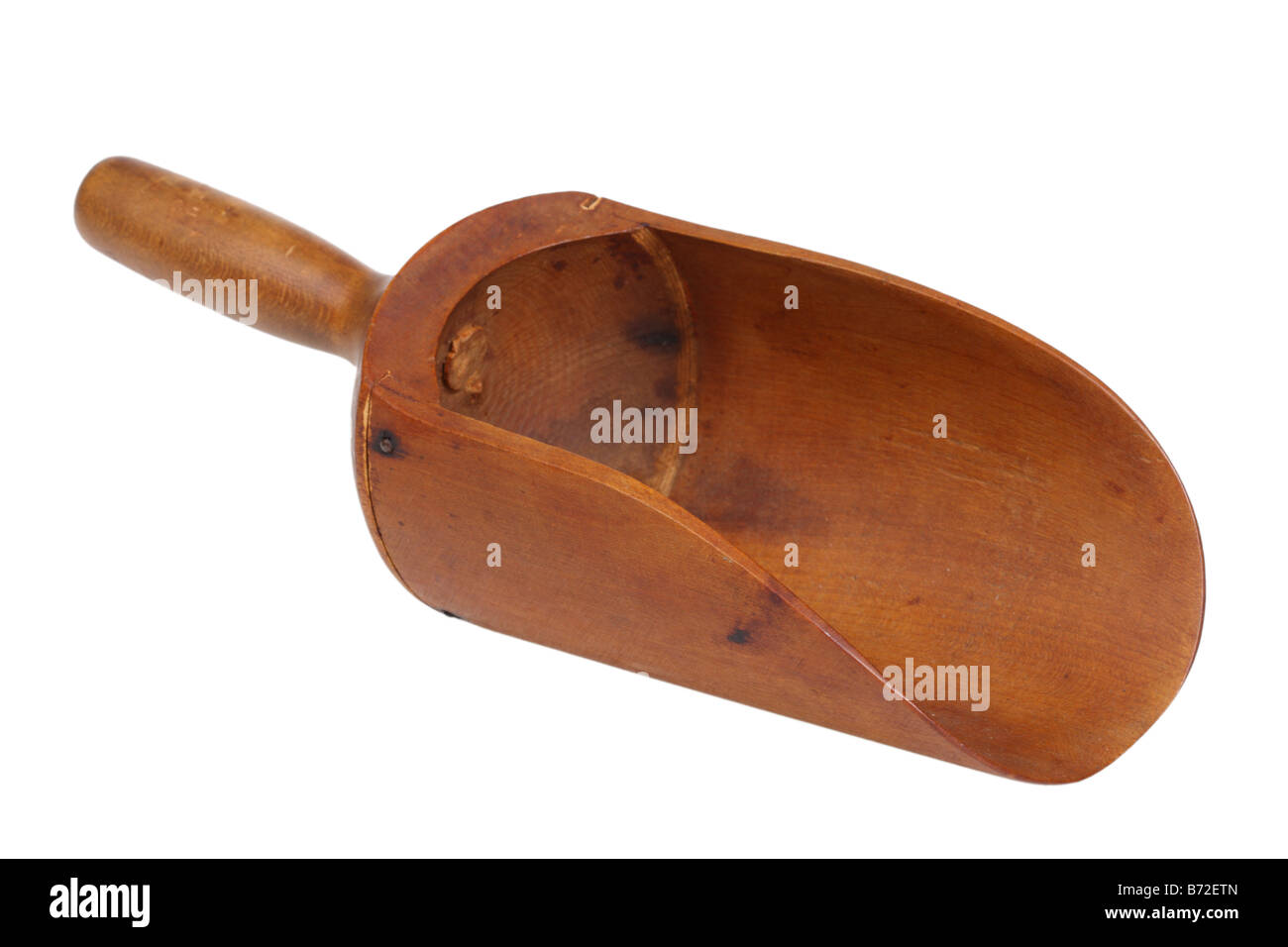 Antique wooden scoop cut out on white background Stock Photo