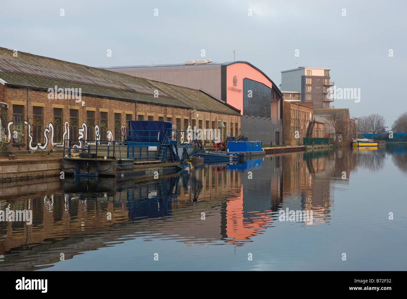 Old Industrial buildings overlooking the Lee Navigation at Old Ford Lock in 2008 before redevelopment Stock Photo