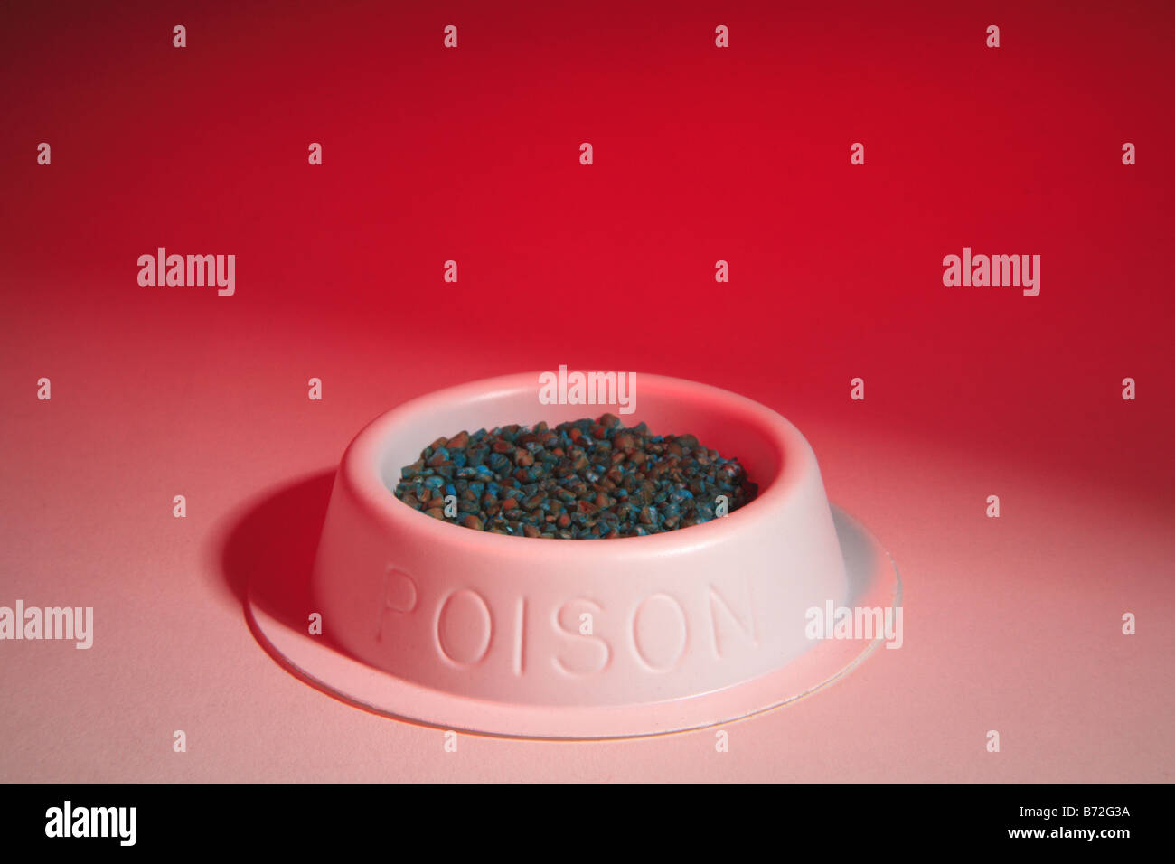 Rat poison killer mouse mice vermin deadly pellets red danger Stock